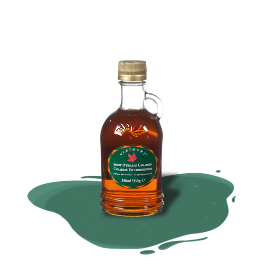 Pure organic Vermont maple syrup, Grade A, tapped from Canadian maple trees, smooth texture with natural minerals and balanced amber flavor.