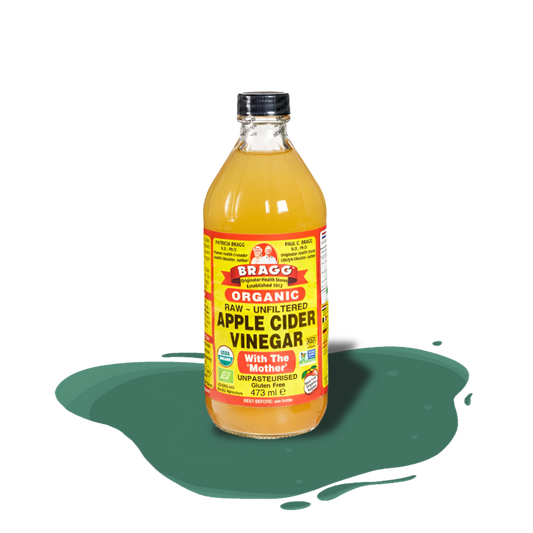 Raw, unfiltered organic apple cider vinegar by Bragg, made from fresh-pressed apples with natural enzymes and live cultures known as ‘the mother’.